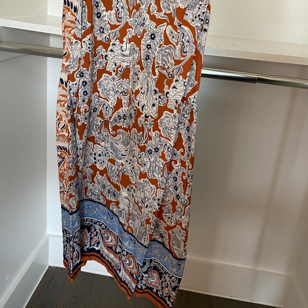 Wide leg flowy dressy pants. Beautiful burnt orange print